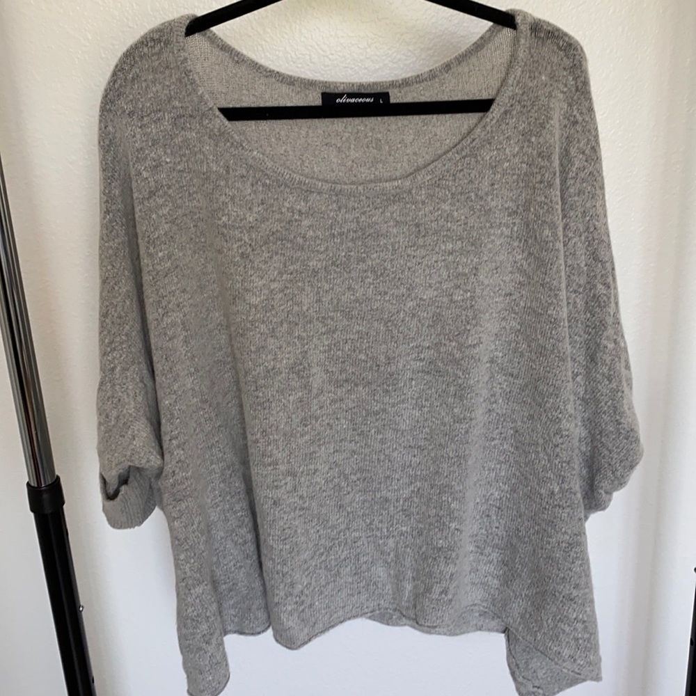 Gray soft throw over sweater
